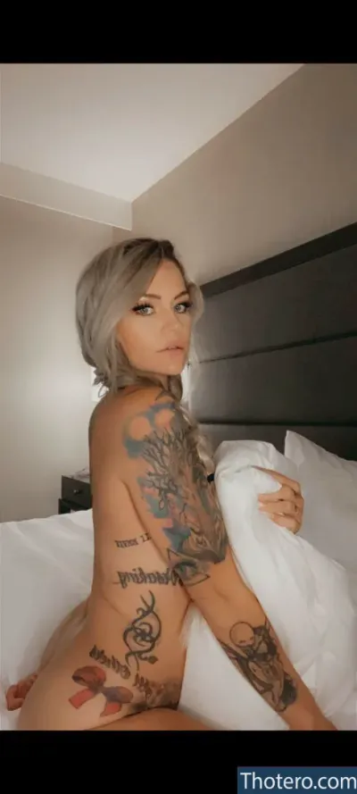 cassidy_cabrera - a close up of a woman with tattoos on her body