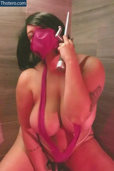 Lisitsa - woman in a pink lingerie talking on a cell phone